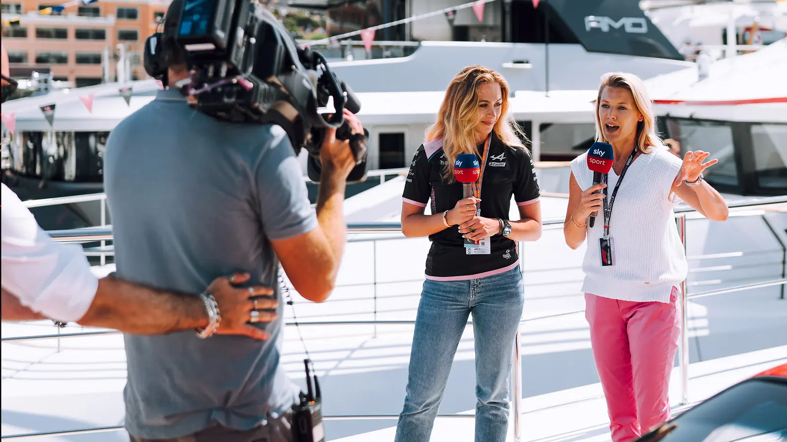 A television crew interviewing guests onboard the Ultimate Superyacht in Monaco